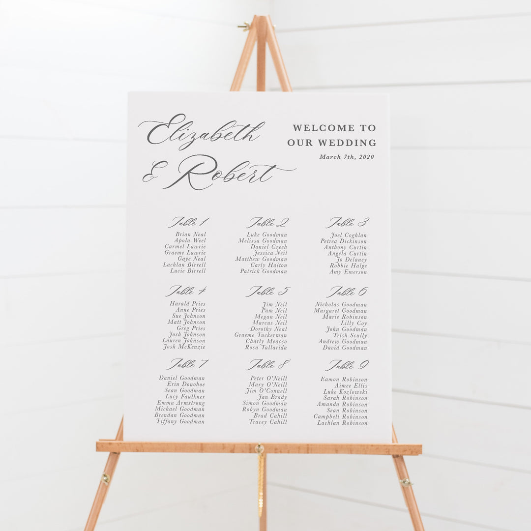 Wedding seating chart, guest name plan, features beautiful modern calligraphy font. Mounted to board for display on an easel.
