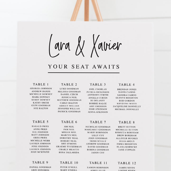 Modern wedding seating chart or guest seating plan. Modern script upright font with your seat awaits as heading. All colours can be adjusted.