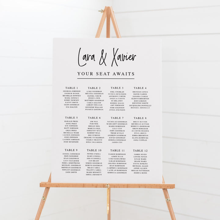 Modern wedding seating chart or guest seating plan. Modern script upright font with your seat awaits as heading. All colours can be adjusted.