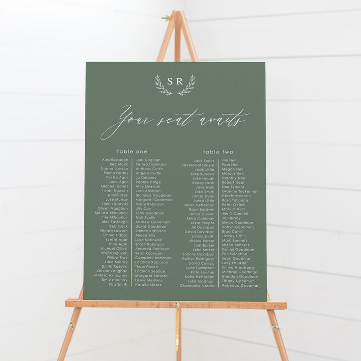 Wedding seating chart with monogram of bride and grooms initials and calligraphy font. Printed on pvc foam board or acrylic.