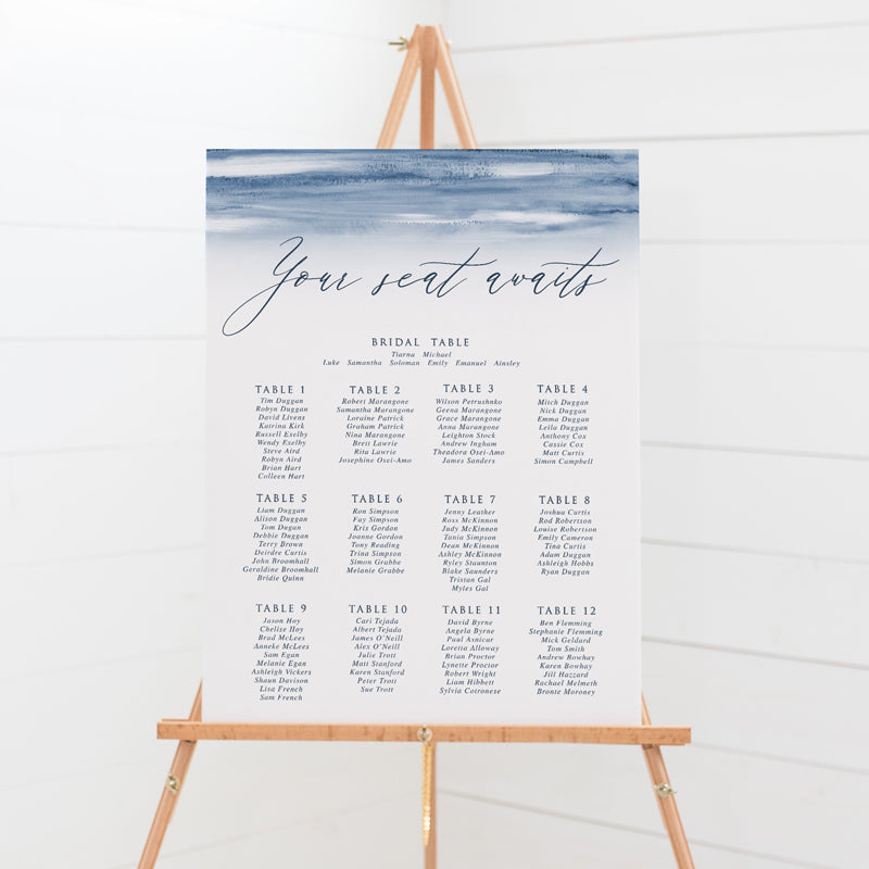 Wedding seating chart or guest plan with navy blue watercolour wash and modern calligraphy font