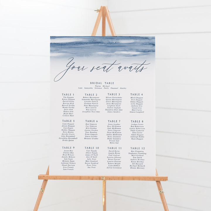 Wedding seating chart or guest plan with navy blue watercolour wash and modern calligraphy font