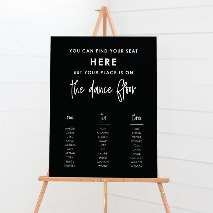 Wedding seating chart in black and white. You can find your seat here but your place is on the dance floor heading, in banquet layout. Designed and printed in Australia or DIY seating plans Australia.