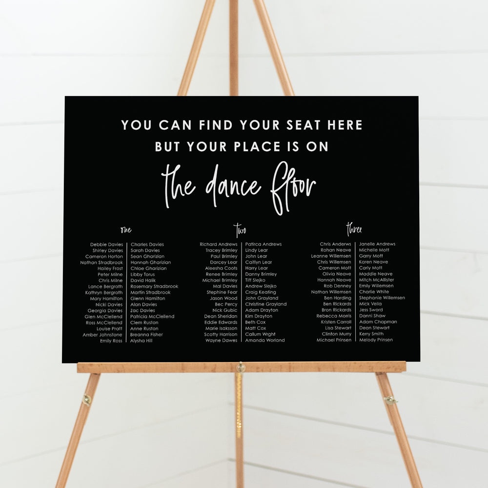 Wedding seating chart in black and white. You can find your seat here but your place is on the dance floor heading, in banquet layout. Designed and printed in Australia or DIY seating plans Australia.