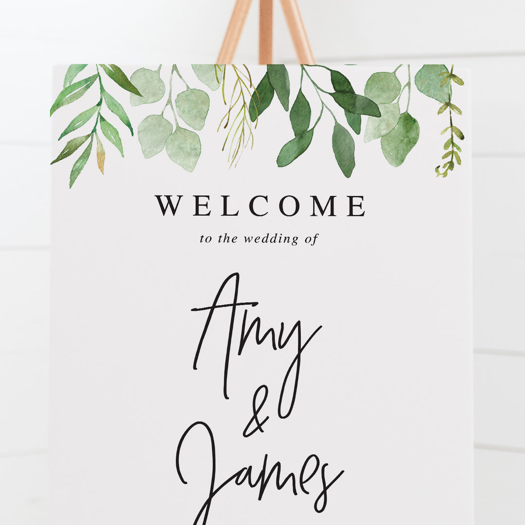 Wedding welcome sign with green leaves and modern script font