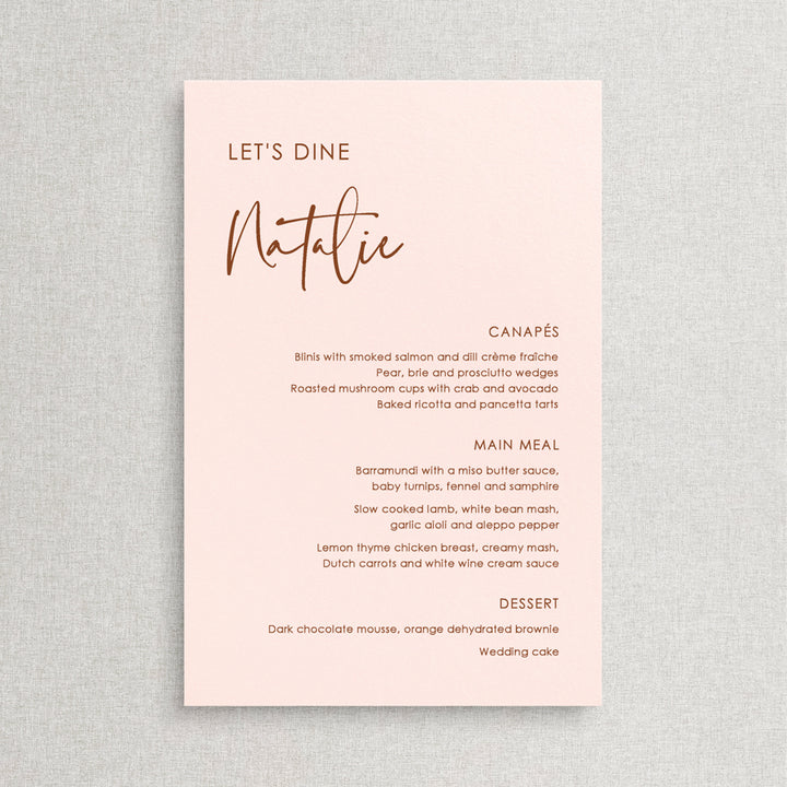 Modern wedding menu with Lets Dine for heading and guest name printing. Blush cardstock and terracotta text. Designed in Australia.